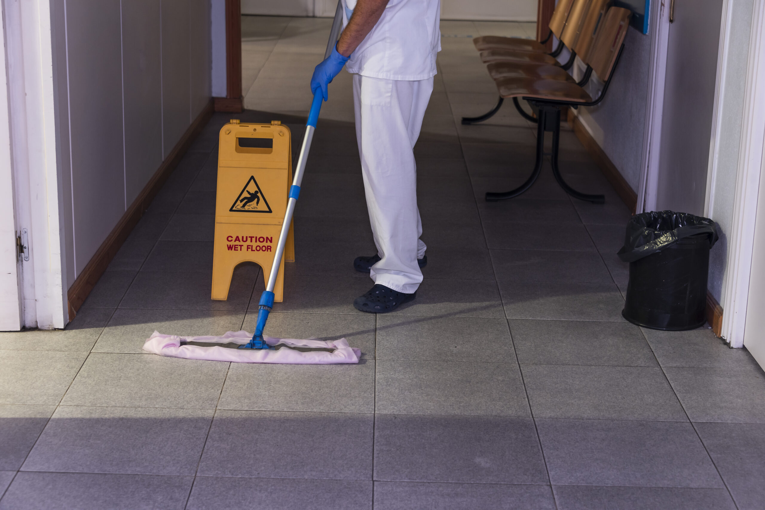 Conceptual photo of a hospital worker cleaning the ward
